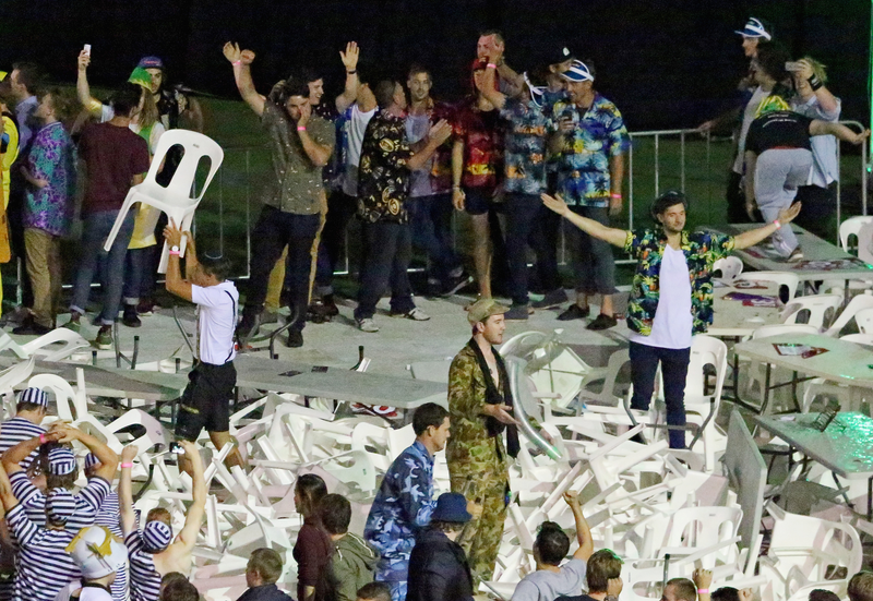 Illustration for article titled Rioting Costumed Fans Halt Australian Darts Competition